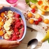 Chiquita banana raspberry smoothie bowl with melon and nuts