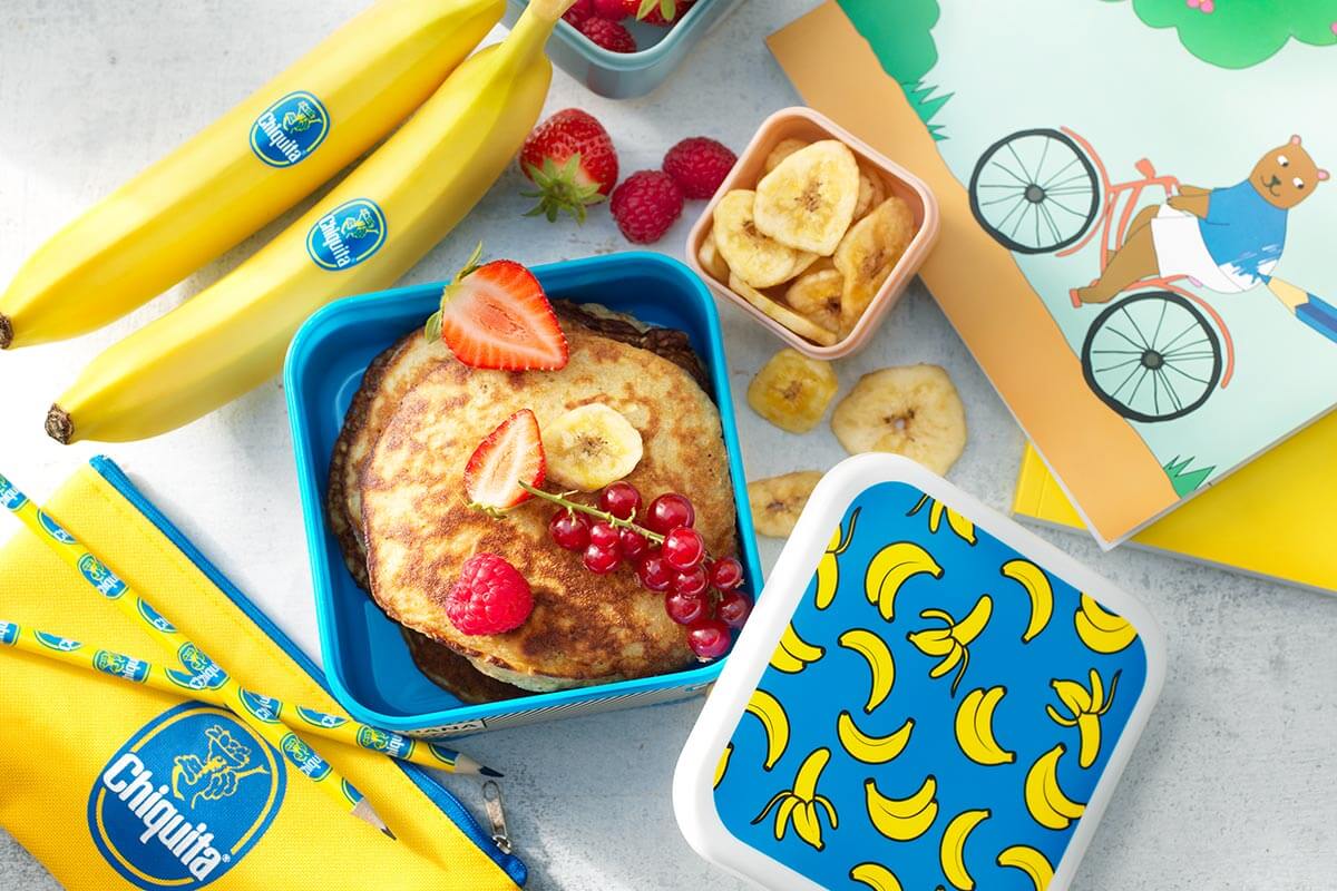 Easy Chiquita banana pancakes with mixed red fruits and banana chips