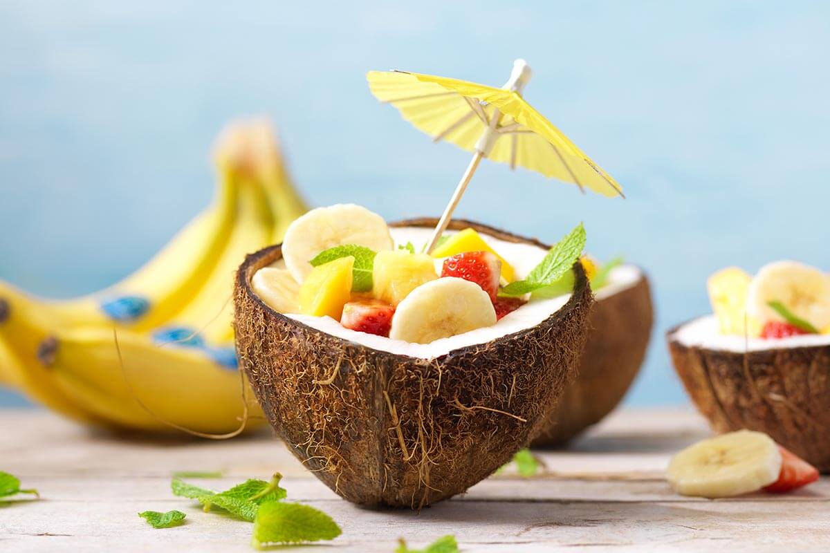 Fruit salad with Chiquita bananas in coconut bowls | Chiquita Recipes
