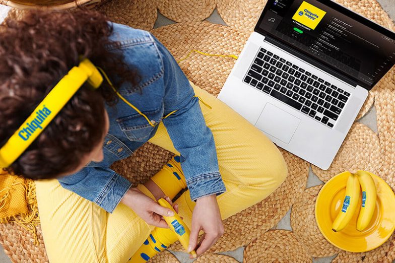 Chiquita's new playlists on Spotify - women with computer